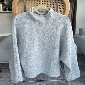 Grey turtleneck sweater